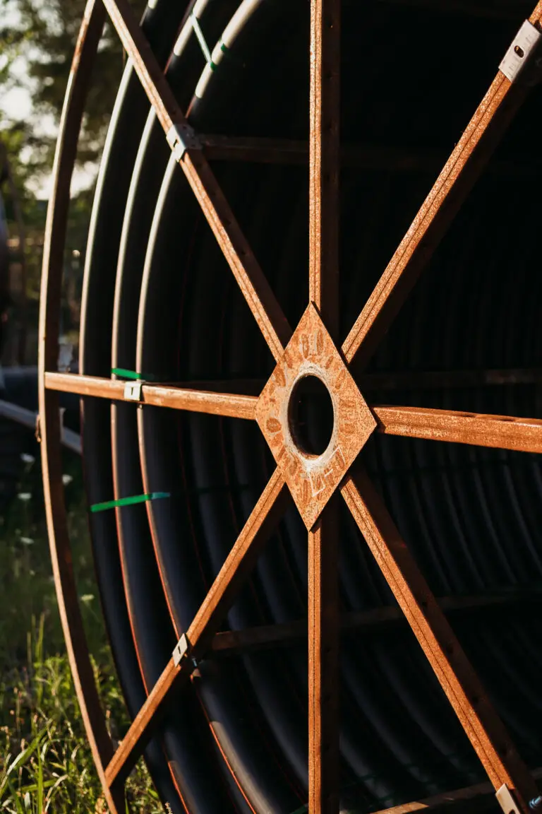 Close-up detail of conduit reel spool used by Precision Utility Construction